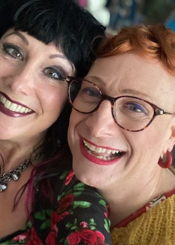 Melody and Jo smiling cheek to cheek